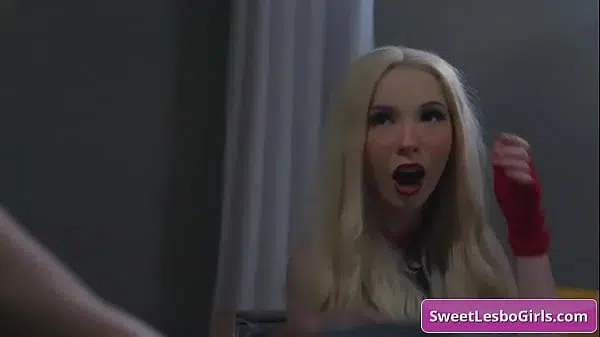 See this blondie lesbo sluts kiss and make out on the couch