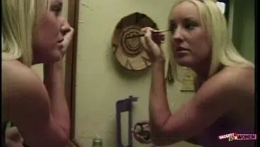 Two gorgeous blondes have some outdoor pleasure while gripping their pussies.